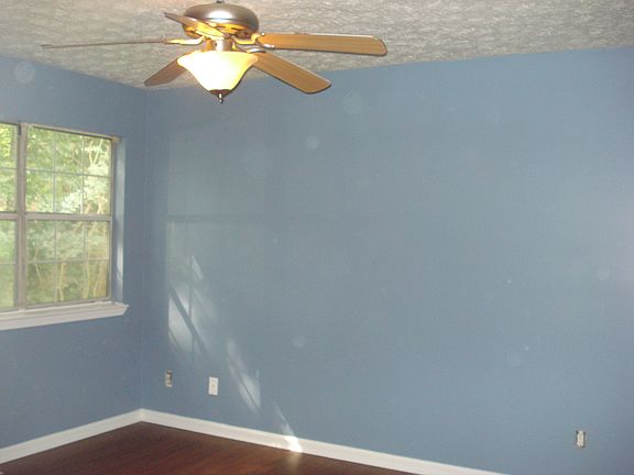 One of the Three Bedrooms