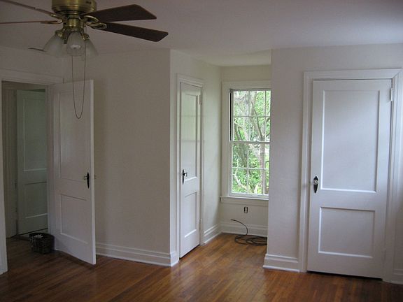 Master bedroom upstairs has three closets, lots of sunlight, and hardwood flrs