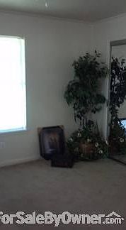Master Bedroom
						:
						1/2 bath attached. View of one of two windows and mirror
closet sliding door