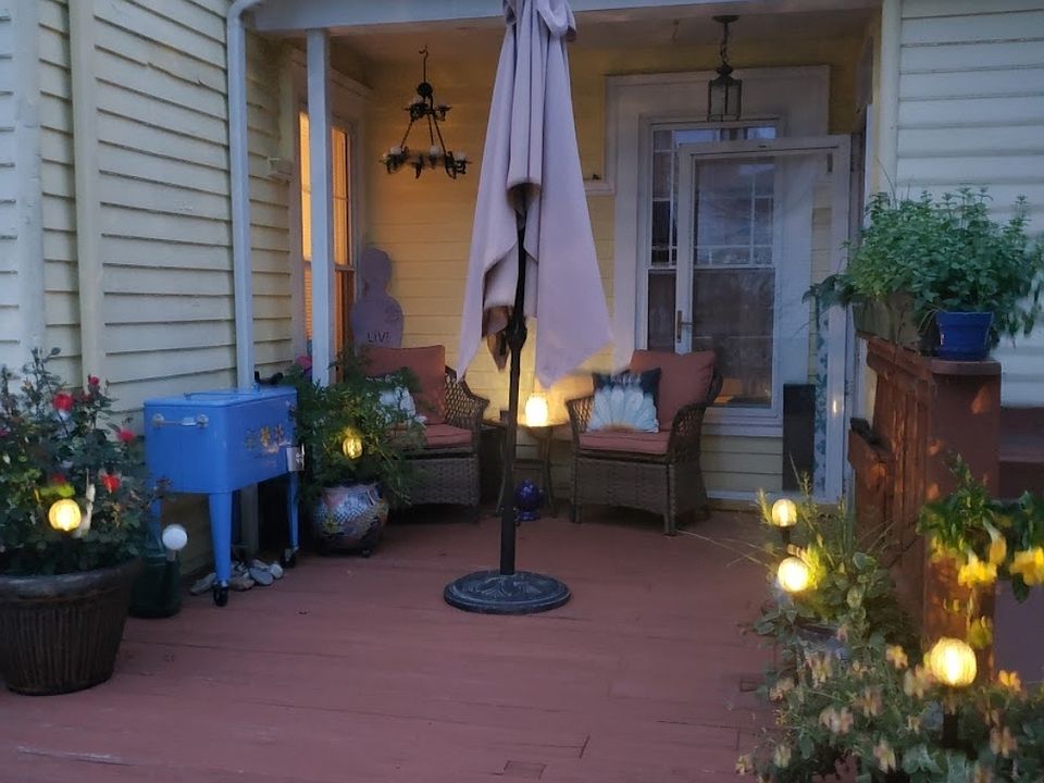 Entry and designated deck area to the first floor unit on shared deck.