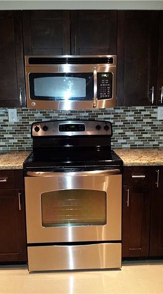 2nd image of 9520 Seagrape Dr APT 104