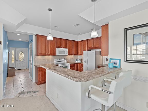 5th image of 8855 Radcliff Drive NW Unit 51b