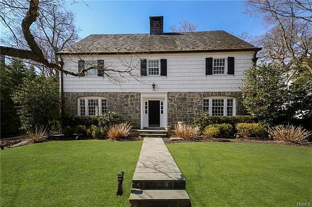 Welcome home to your stone front Colonial in the heart of Edgewood.
