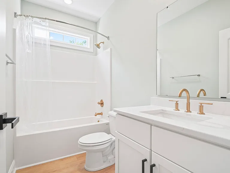 hallway bath shared by bedrooms 2 & 3