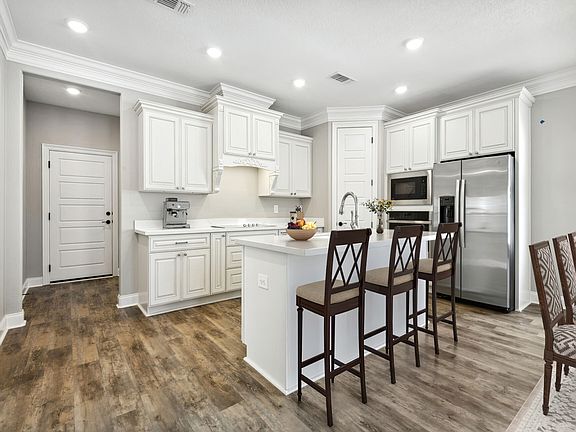Kitchen in the Royale floorplan at a Meritage Homes community in Gulfport, MS.