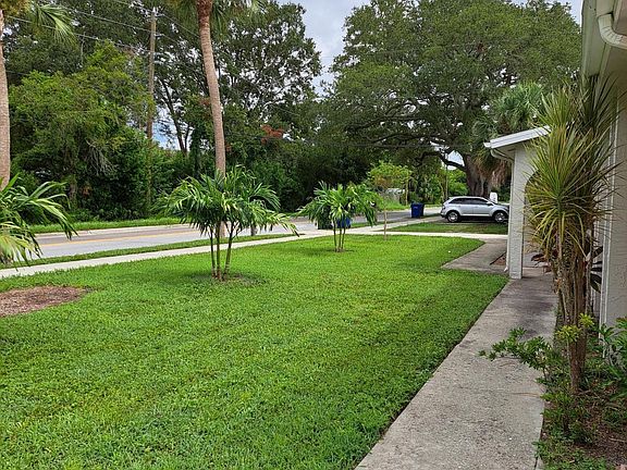 From drive way looking towards front of home