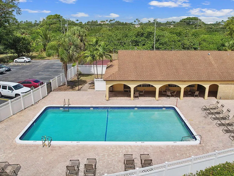 view of pool and club house