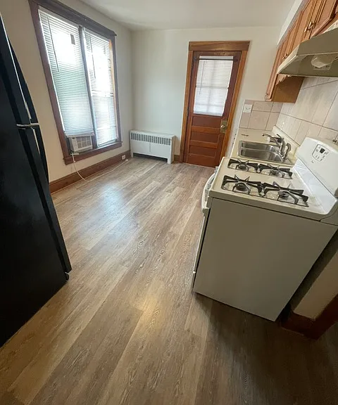 kitchen with door to back porch