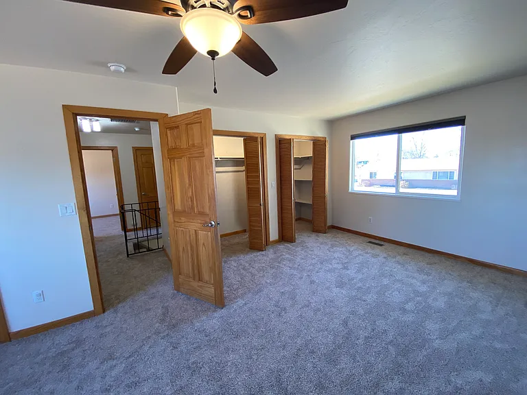 Spacious primary suite with attached bathroom, great natural light, and plenty of room to create your own retreat.