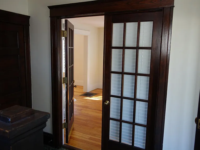 French doors leading to living room from foyer