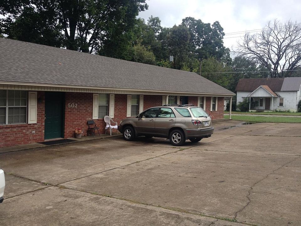all brick triplex
