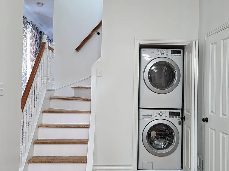 Stacked Laundry, Stairs up to Bedroom and Full Bath