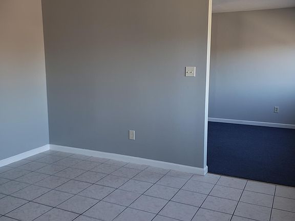 Dining area leading to the kitchen