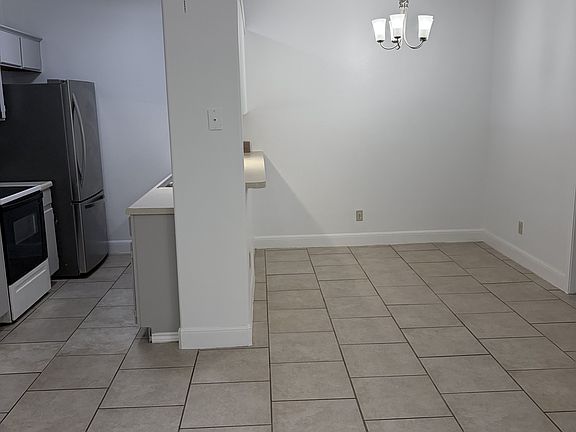 Dining area with kitchen and pass through bar