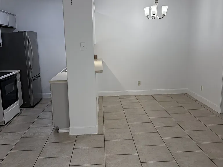 Dining area with kitchen and pass through bar