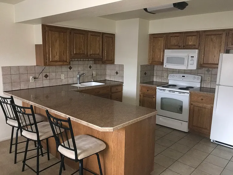 Kitchen with Bar Sitting