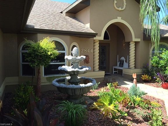 2844 SW 47th Ter Front entrance with 3 tier water fountain