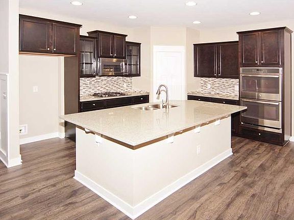 Model photo of same home. Please check construction stage of