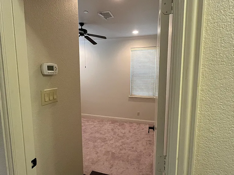 Private guest suite with attached bath. This can be used as study or office