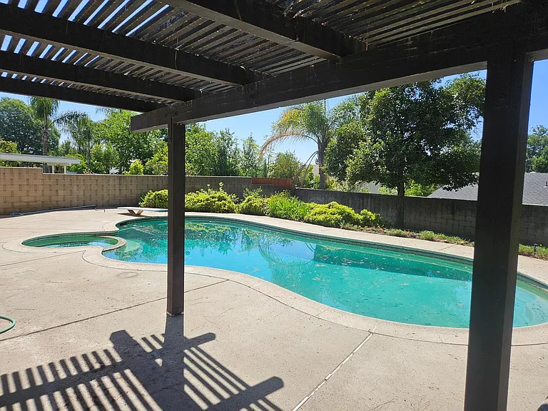 view of pool from kitchen