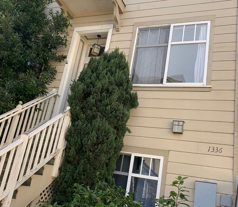 1336 Sanchez Street - front facade. Gated, and tucked in behind a single family home in Noe Valley.