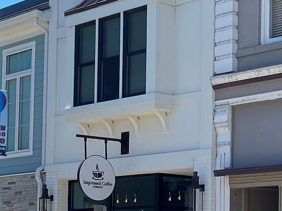 Main Street loft, above commercial space for Impressed Coffee.