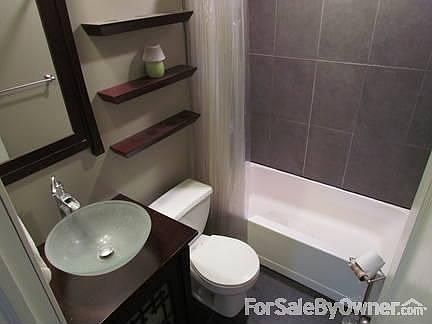 Back bedroom
						:
						Beautiful hardwood floors, ceiling fan, extra storage.