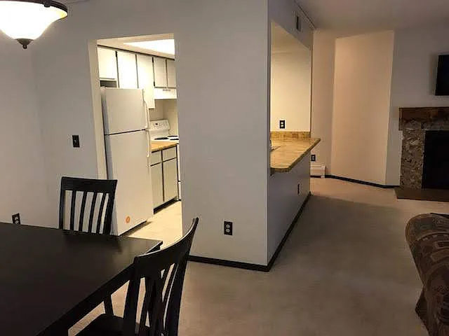 Dining Room Into Kitchen and Living Room