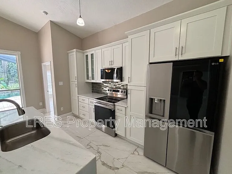 1028 Kerwood Cir — Photo 14