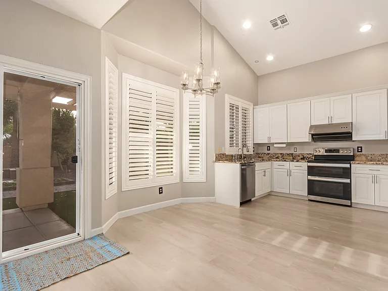 Kitchen with Sliding Glass Doors Opening to the Backyard.
