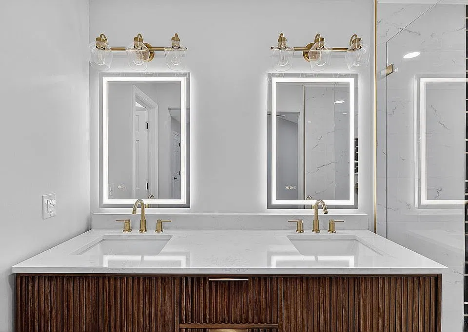 Lighted and heated mirrors