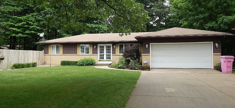Front of house  2 car garage
