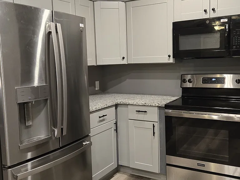 Kitchen stove & fridge area