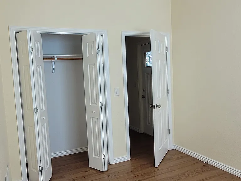 2nd Bedroom with a roomy closet and folding doors