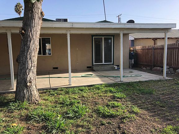 West side of covered patio in backyard