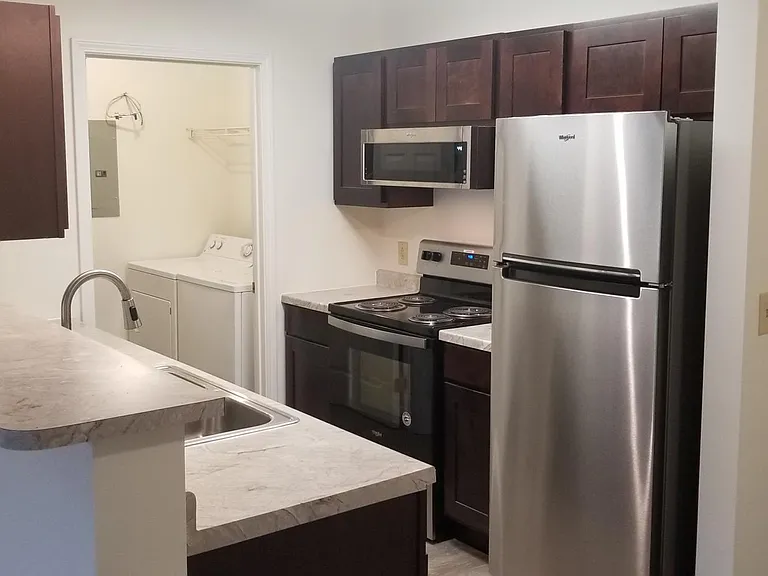 Select units have upgraded premium cabinets and Stainless steel appliances.