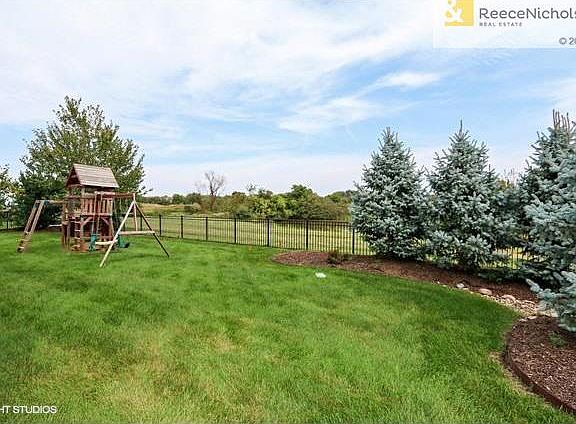 Check out the greenspace and privacy in the lush, fenced back yard