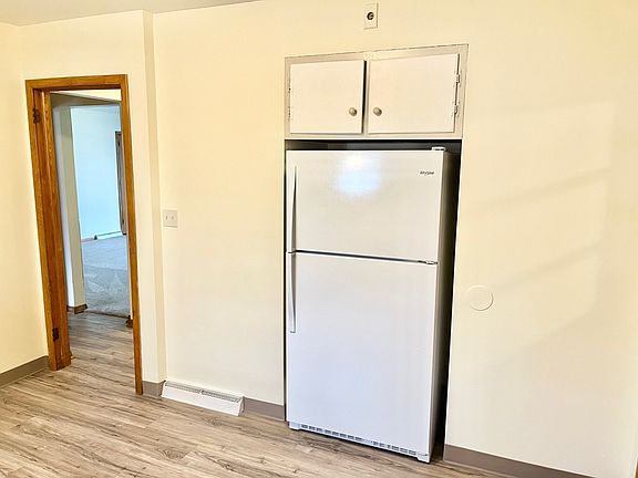 Large fridge and extra storage.