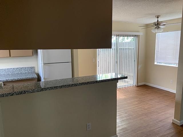 View towards kitchen and dining room, from front door