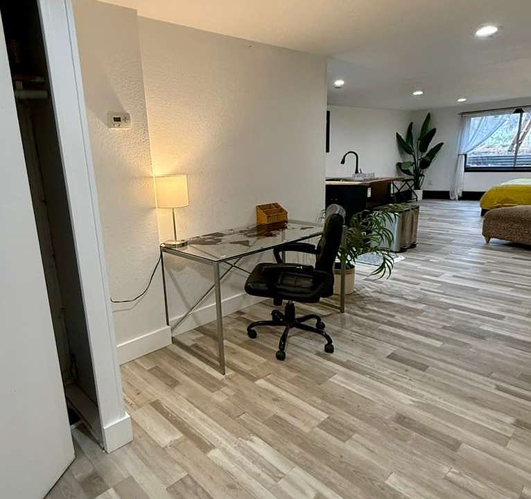 Entry way into apartment, small built in closet.