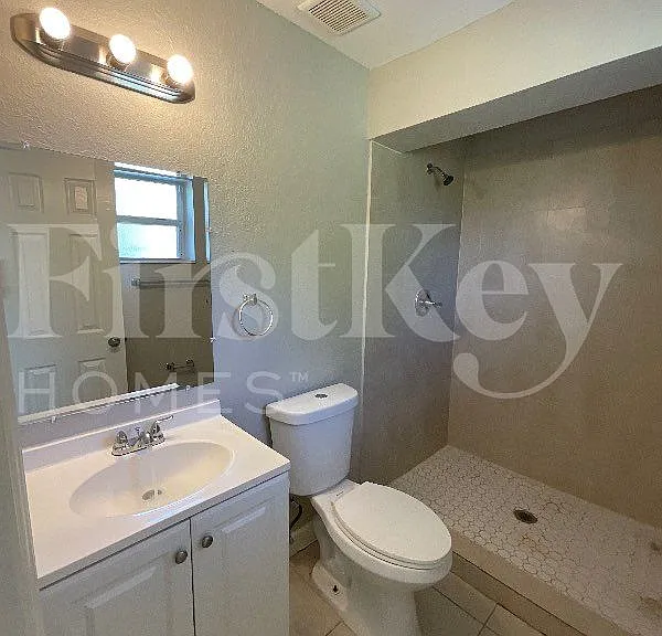5980 NW 24th Ct — Photo 13