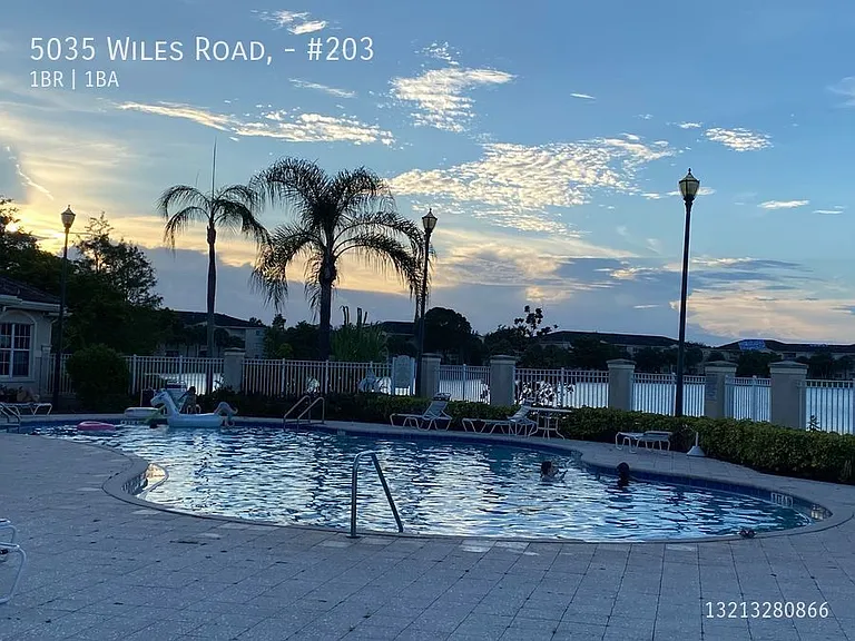 5035 Wiles Rd #203 — Photo 38