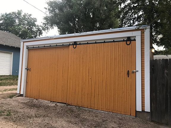 Deep, 2-car garage with additional storage space - front view