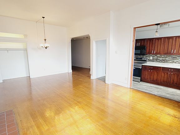 Living room facing kitchen