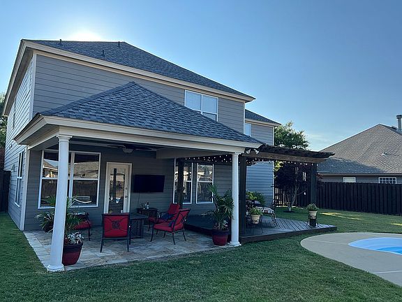 Covered porch with TV
