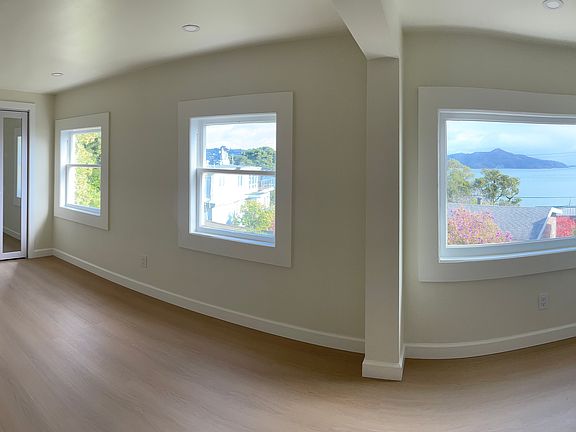 Fisheye view of the master bed room. Wake up and go to sleep to beautiful views the SF Bay .