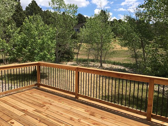Deck with metal spindles