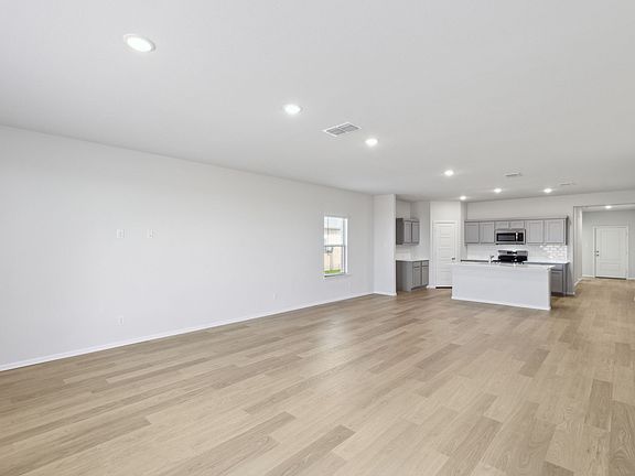 Open First Floor in the Holden home plan by Trophy Signature Homes - REPRESENTATIVE PHOTO