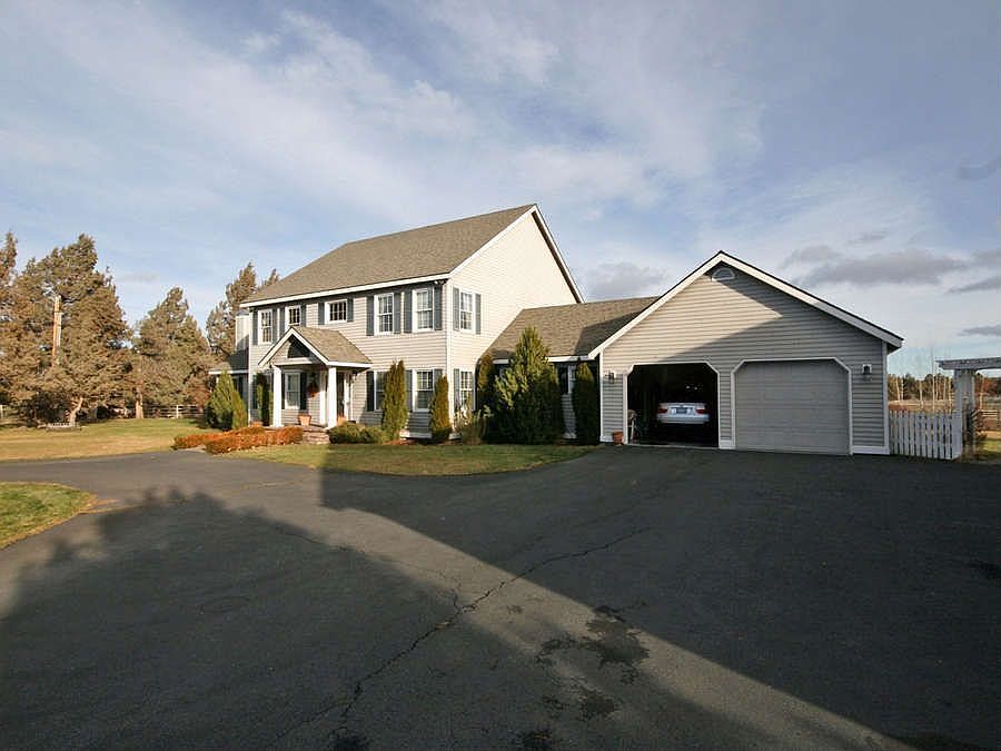 "This Home Has A Double Car Garage & A Double Car Detched Garage"