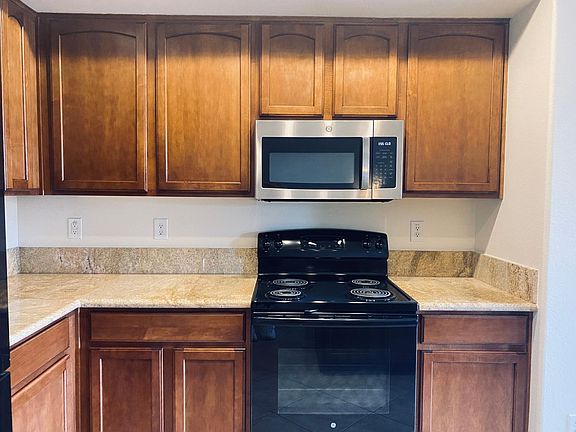 Plenty of cabinets (new condition) and counter space.